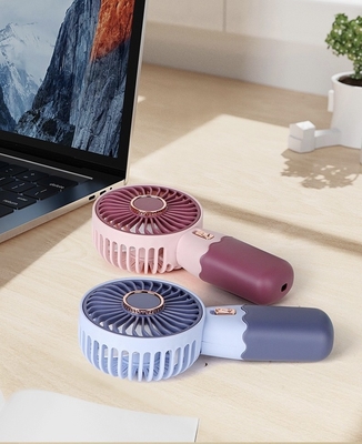 크리에이티브 만화 미니 핸드헬드 냉각용 작은 팬 휴대용 USB 충전 전화 스탠드 작은 팬 2024 라마단 제품
